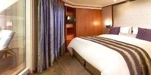 Croisière NCL Norwegian Cruise Line Sun Penthouse face à l'arrière du navire (poupe) avec grand balcon