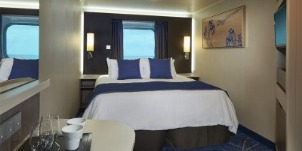 Croisière NCL Norwegian Joy Vue mer au milieu du navire avec grande fenêtre panoramique