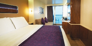 ncl norwegian cruise line breakaway mini suite face à l'arrière (poupe) avec grand balcon chambre à coucher